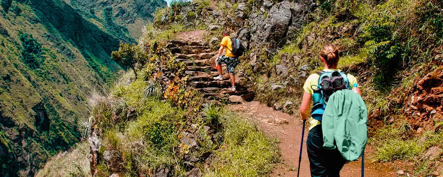 Couple climbing up Inca Jungle trail